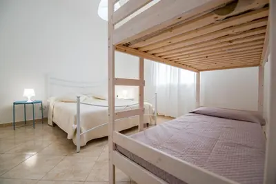 Letto o letti in una camera di Villa Sasè - SiciliaVacanza