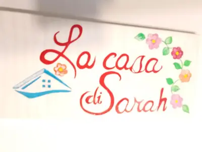 Certificato, attestato, insegna o altro documento esposto da La casa di Sarah