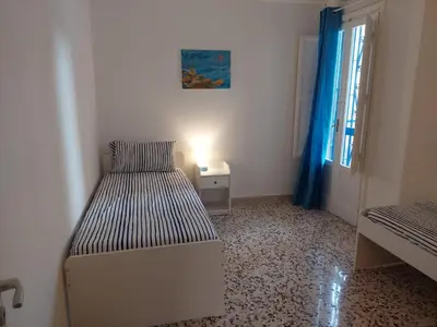 Letto o letti in una camera di Casa Annalisa