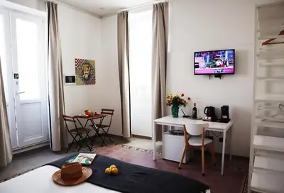 TV o dispositivi per l'intrattenimento presso Fortuna Guest House - Charm & Relax rooms