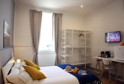 TV o dispositivi per l'intrattenimento presso Fortuna Guest House - Charm & Relax rooms