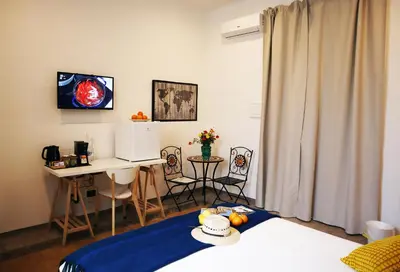 Letto o letti in una camera di Fortuna Guest House - Charm & Relax rooms