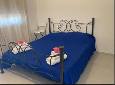 Letto o letti in una camera di Villa Diana