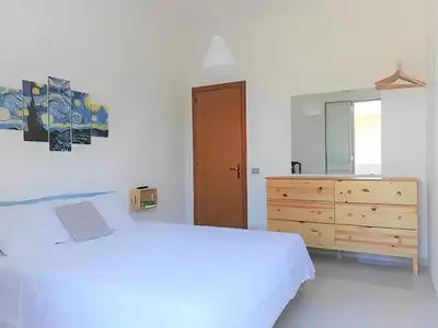 Letto o letti in una camera di BORGO MARINARO casa vacanza