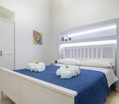 Letto o letti in una camera di ELORO - Guest Houses