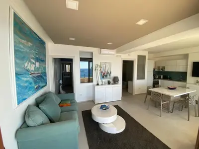 Area soggiorno di I Tri Scogghi , il mare dalla tua camera da letto