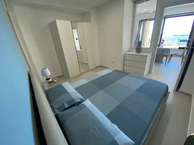 Letto o letti in una camera di I Tri Scogghi , il mare dalla tua camera da letto
