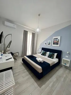 Letto o letti in una camera di Bilateral B&B
