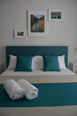 Letto o letti in una camera di Bilateral B&B