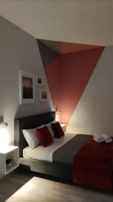 Letto o letti in una camera di Bilateral B&B