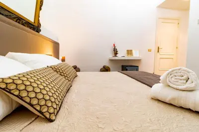 Letto o letti in una camera di Pupi e Pupari