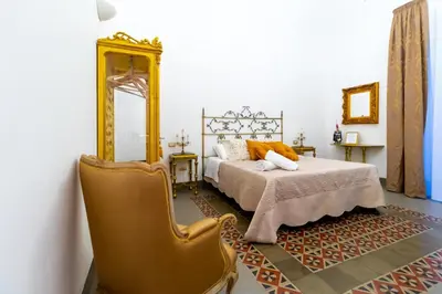 Letto o letti in una camera di Pupi e Pupari