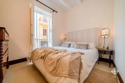 Letto o letti in una camera di Casa Ramal - Tipica dimora Siciliana