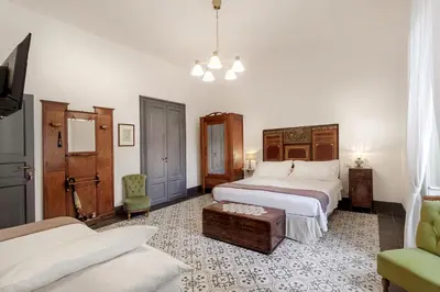 Letto o letti in una camera di I CARIZZI