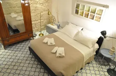 Letto o letti in una camera di I CARIZZI