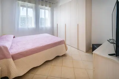 Letto o letti in una camera di Summer Beach Villa a 100mt dal mare Gallina