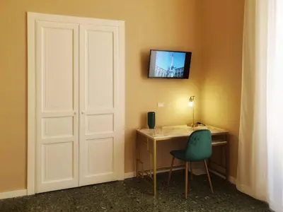 TV o dispositivi per l'intrattenimento presso Palazzo La Piana Rooms