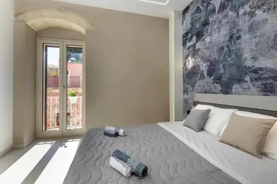 Letto o letti in una camera di Dimora Tre Soli