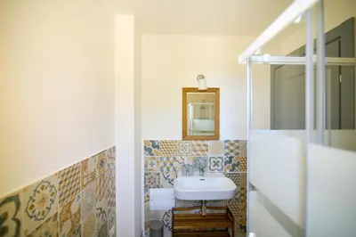 Bagno di LUCCICAMARE family-run BeB