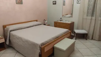 Letto o letti in una camera di Villa Grazia