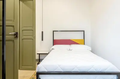 Letto o letti in una camera di MYMOON Val di Noto