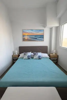 Letto o letti in una camera di La Battigia