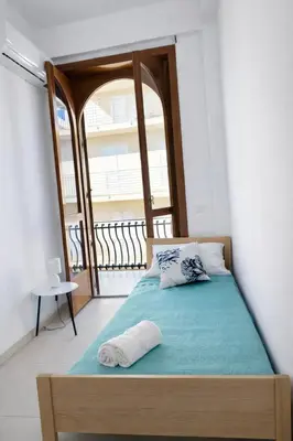 Letto o letti in una camera di La Battigia