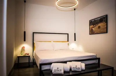 Letto o letti in una camera di MYMOON casa vacanze Noto