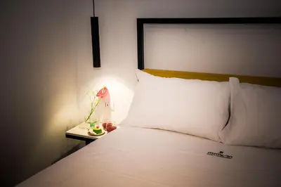 Letto o letti in una camera di MYMOON casa vacanze Noto