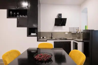 Cucina o angolo cottura di MYMOON casa vacanze Noto