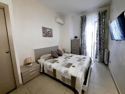 Letto o letti in una camera di Campi Elisi