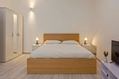 Letto o letti in una camera di InternoUno al Duomo