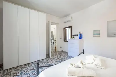 Letto o letti in una camera di Pietranera Residence