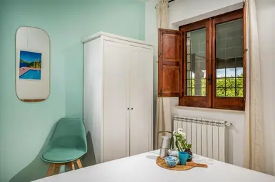 Letto o letti in una camera di Il Giardino Dei Limoni 8, Emma Villas