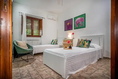 Letto o letti in una camera di Il Giardino Dei Limoni 8, Emma Villas