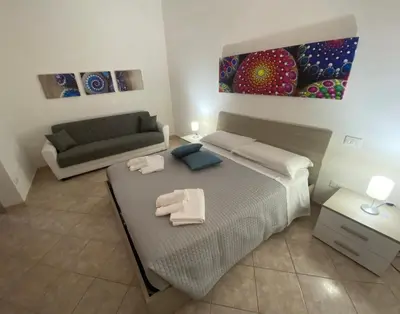 Letto o letti in una camera di Casa vacanze Mandalà