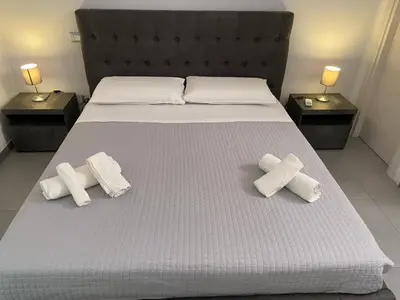 Letto o letti in una camera di Casa vacanze Mandalà