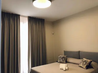 Letto o letti in una camera di Di Rosa Apartment