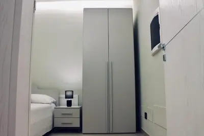 Letto o letti in una camera di Di Rosa Apartment