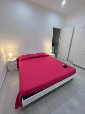 Letto o letti in una camera di Case Vacanze nonna Elisa