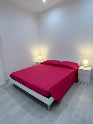 Letto o letti in una camera di Case Vacanze nonna Elisa