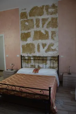 Letto o letti in una camera di Case Vacanze nonna Elisa