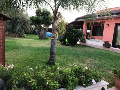 Giardino di La stanza delle Muse in Villa con Piscina