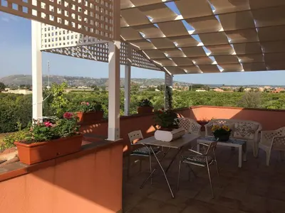 Balcone o terrazza di La stanza delle Muse in Villa con Piscina