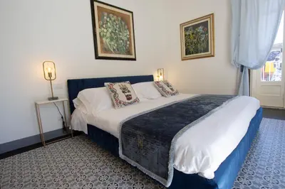Letto o letti in una camera di Palazzo d'Autore - Luxury Home - Ragusa Centro