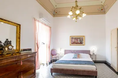 Letto o letti in una camera di Palazzo d'Autore - Luxury Home - Ragusa Centro