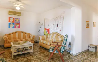 Area soggiorno di Nice Home In Noto With Kitchen