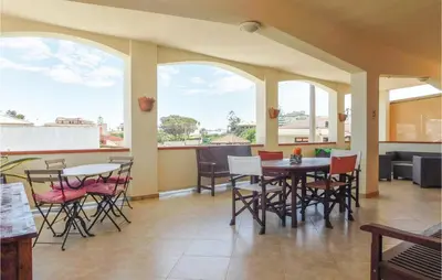Area soggiorno di Nice Home In Noto With Kitchen