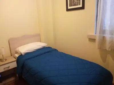 Letto o letti in una camera di Mazzini House