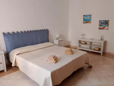 Letto o letti in una camera di Lina's Sweet Home